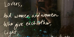 Snippet of a queer love letter on a window