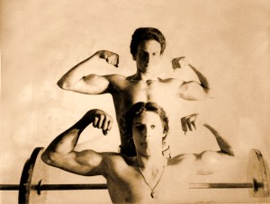 Two men present their muscles