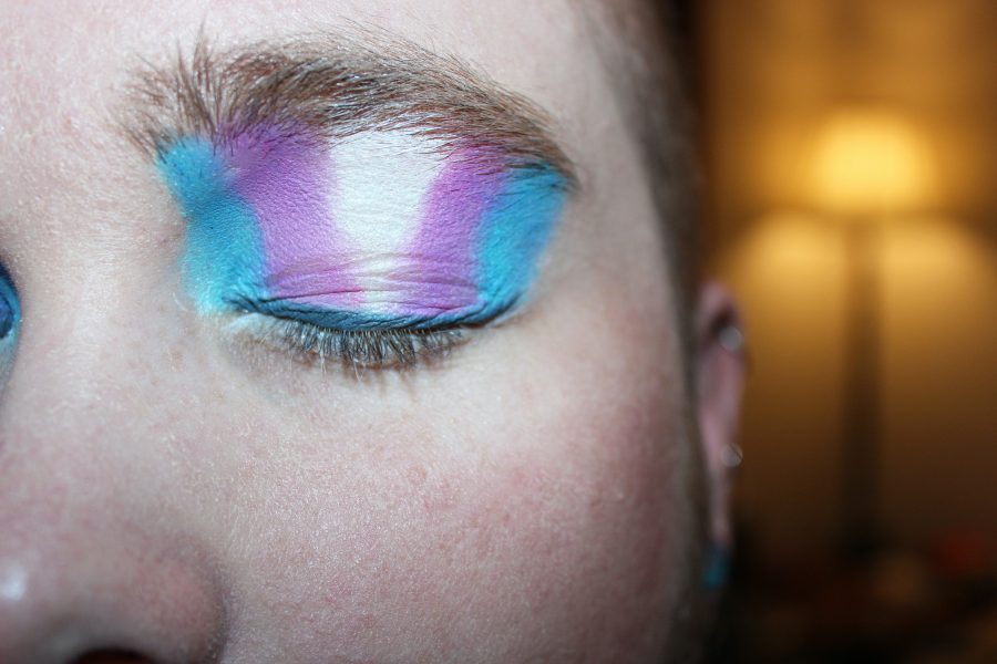 Person wearing transgender pride eyeshadow