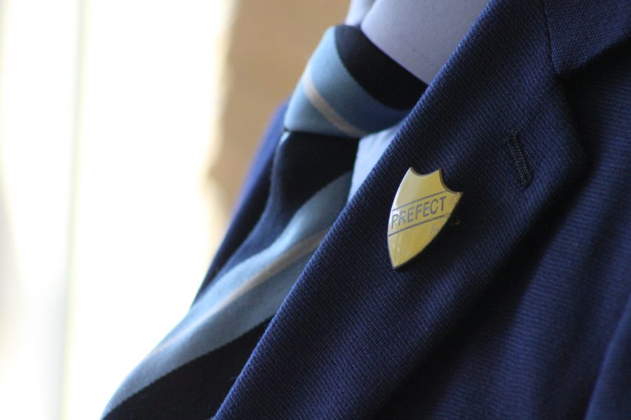 Prefect badge on a school uniform