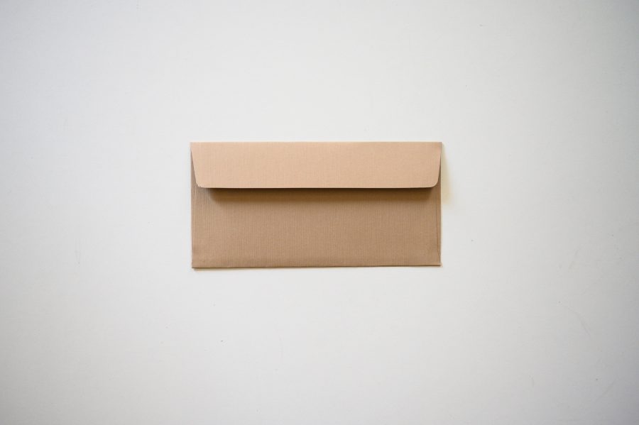 Brown envelope against cream background