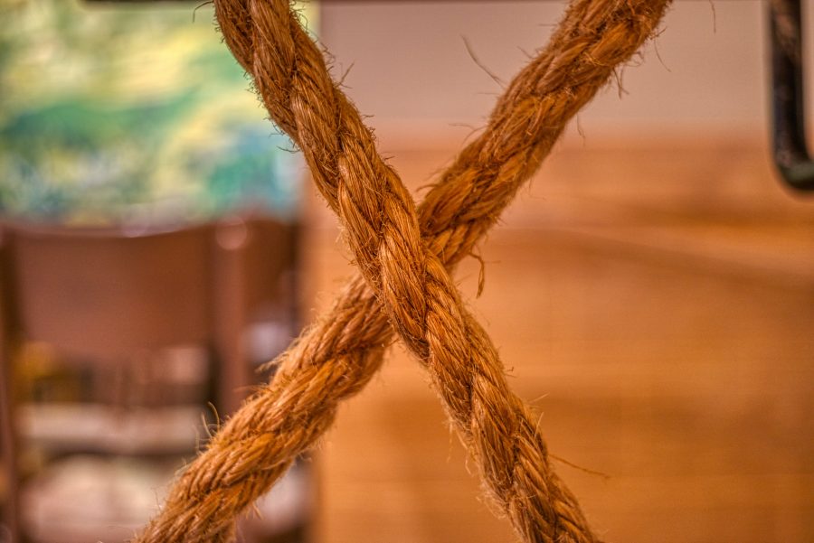 Brown rope in the shape of an 'X'