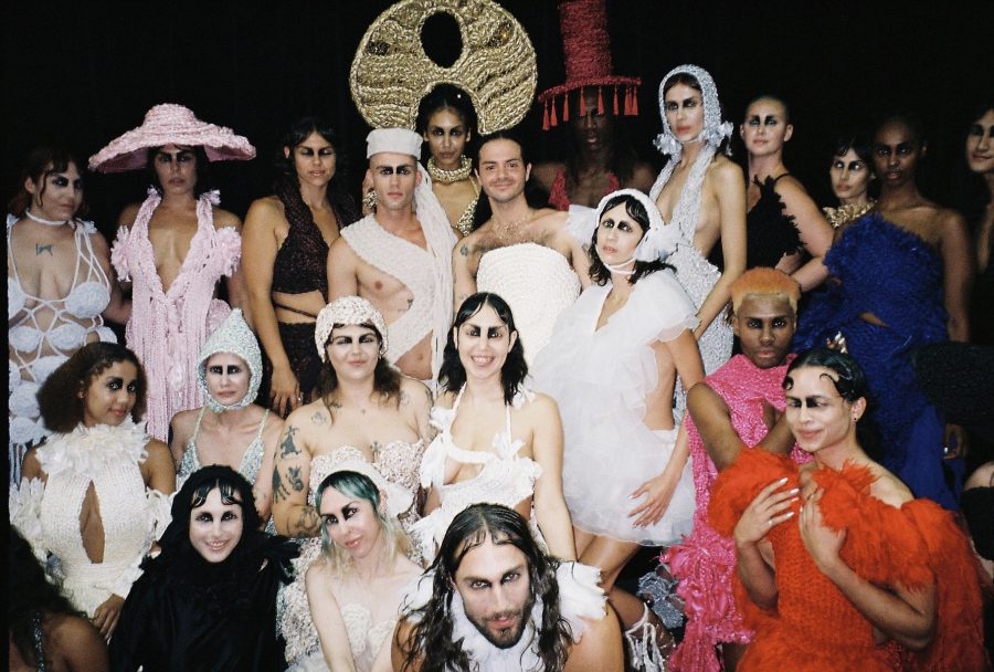A group of people dressed in Nathaniel Youkhana's designs.