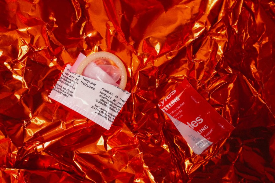A condom on orange wrapping, to represent sex education in Nigerian households.