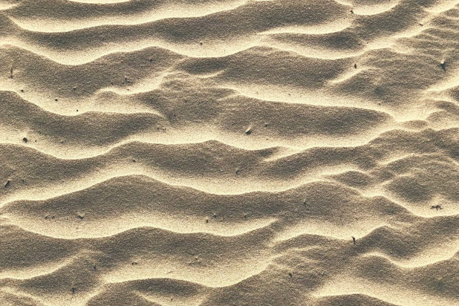 Wavy sand on the beach.