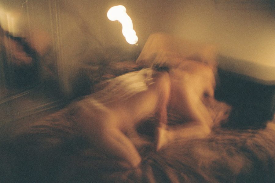 Blurred footage of two people having sex.