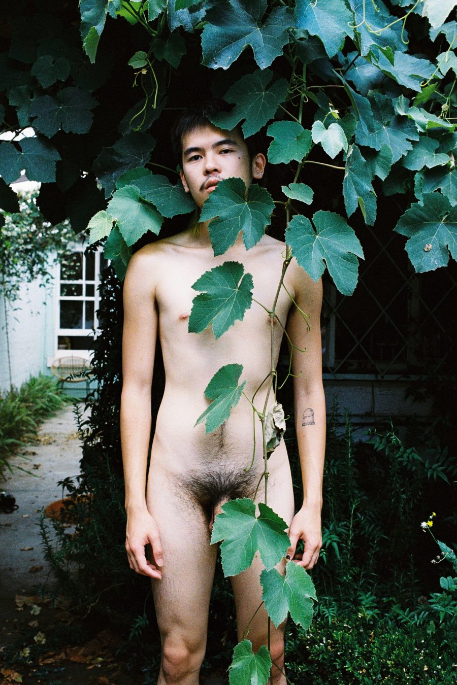 A naked person in nature, taken by J Davies and exhibited in The Future Feels Familiar.