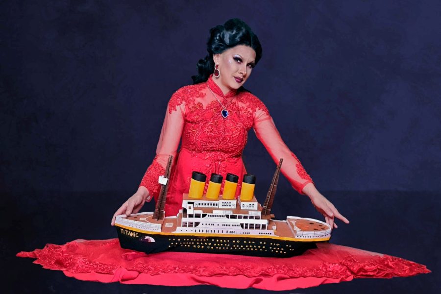 Linh Uendo with a model of the Titanic.