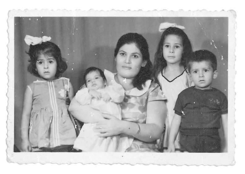 Souhailah Sabawi with her children, Abir, Samah (infant), Khulud and Hussein, before their exile from Gaza in 1967.