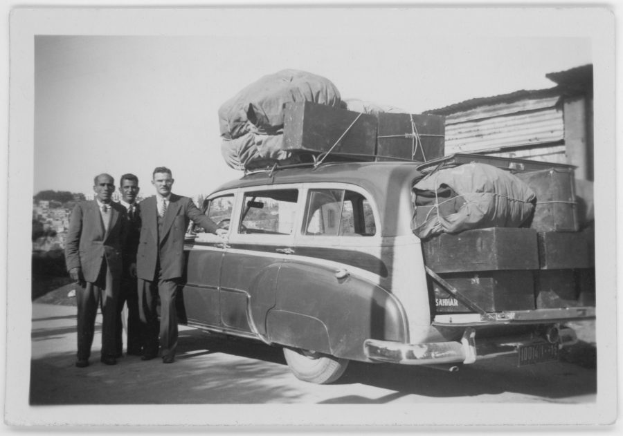 Sahhar family with a car full of their belongings.